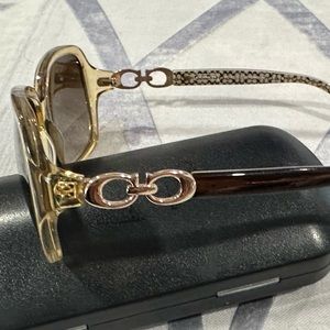 Coach sunglasses with CC logo on side